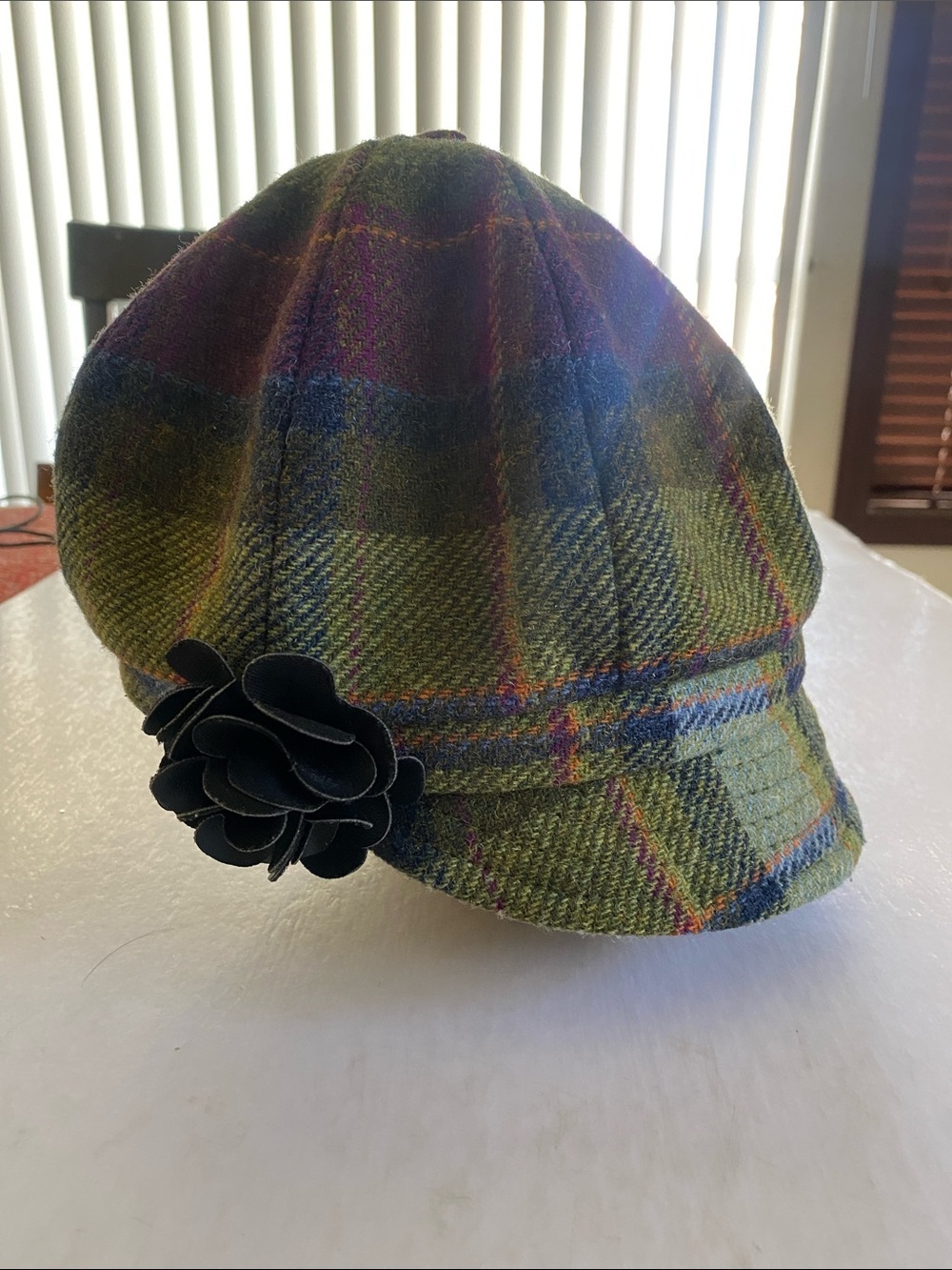 Mucros Weavers Plaid Newsboy Cap with Black Leather Floral Accent  OS